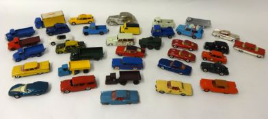 Thirty five playworn and re-painted Dinky and Corgi toys