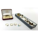 A mixed lot of jewellery including three decorative gold rings, various brooches etc