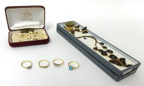 A mixed lot of jewellery including three decorative gold rings, various brooches etc