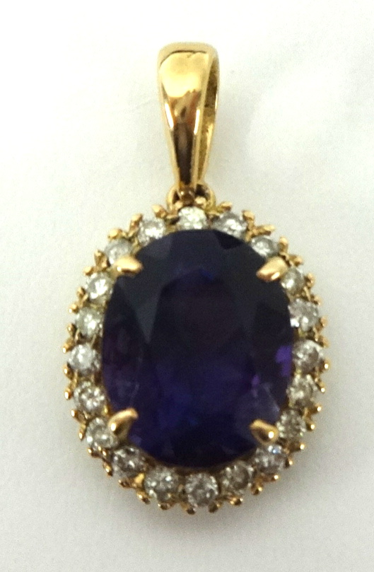 An amethyst and diamond pendant (matching lot 183)