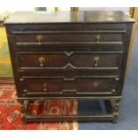 An dark oak three drawer chest t/g an oak and carved sideboard