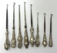 Collection of eight silver handled antique button hooks