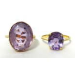 Two pale amethyst and gold set dress rings