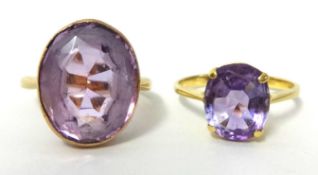 Two pale amethyst and gold set dress rings