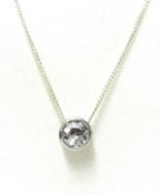 A diamond pendant approximately 1.00 ct with a silver chain