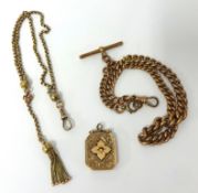 A 9ct gold watch chain approximately 61g with T bar and a separate locket