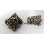 A white metal brooch formed as a terrier dog head with red glass eyes t/w a four owl bar brooch (2)