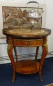 A reproduction Louis XV style circular table fitted with drawer (of similar design to Lot 10 and
