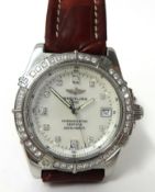 A Ladies Breitling wrist with diamond bezel and m.o.p. type dial, chronometer with original outer