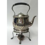 A silver plated spirit kettle with stand