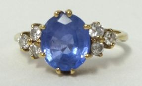 A sapphire and diamond ring in 9ct gold, ring size L