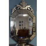 A Venetian style decorative wall mirror, 105cm  tall