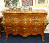 A reproduction Louis XV style bombe commode chest with marble type top fitted with and arrangement