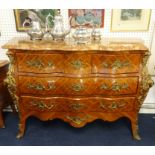 A reproduction Louis XV style bombe commode chest with marble type top fitted with and arrangement