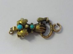 A 19th century long chain gauntlet hand clasp, set with turquoise