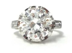 A fine single stone diamond ring. Approximate weight 4.00 carats, with original purchase receipt