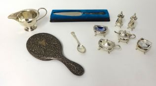 Collection of various silver wares including two three piece condiment sets, cased christening