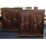 A near pair of Anglo Indian padouk wood two door cupboards, one approximately 111cm wide