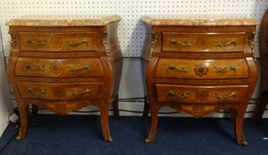 A pair of reproduction Louis XV style bedside chests (of similar design to Lot 10)