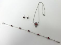 Group of modern jewellery, stamped .925, including bracelet, cross pendant and pair of earrings