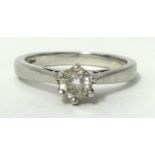 A diamond single stone ring approximately 25 points, ring size M set in white gold