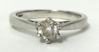 A diamond single stone ring approximately 25 points, ring size M set in white gold