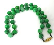 A jade style bead necklace, 56cm