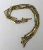 A 19th century yellow metal long chain, 135cm long, with elongated links, approx 33g