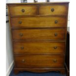 A 20th century mahogany chest fitted with six drawers