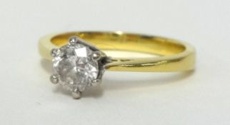 A diamond solitaire ring size M, 18ct , approximately .40 points