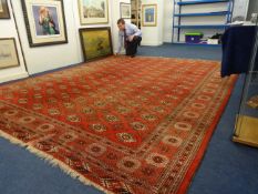 Large old Persian Bukhara Rug, measuring approx  384cm x 295cm
