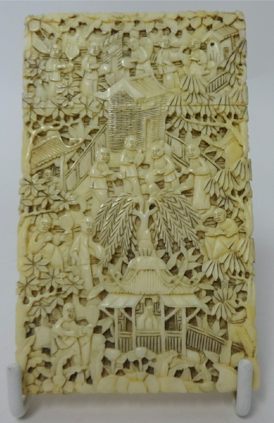 Antique Chinese carved ivory card case, finely carved with figures and trees etc, 10cm high
