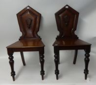 A pair of Victorian mahogany hall chairs also inlaid mahogany side chair