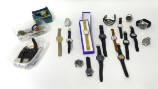 Collection of approximately seventeen various wrist watches t/w a collection of watch parts