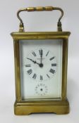 A French brass cased carriage clock, the dial inscribed Henry Capt, Geneva, with alarm, lacks