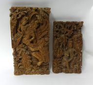 Two wood carvings of Tibetan style, tallest 48cm