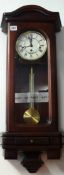 A modern chiming wall clock with mahogany effect case t/w a cased three pull telescope (2)