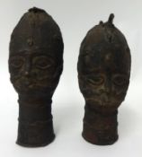 Two antique Benin bronze heads, the tallest 27cm