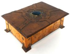 An Arts and Crafts copper box, attributed  A.E. Jones designed by A Stubbs, with decoration to the