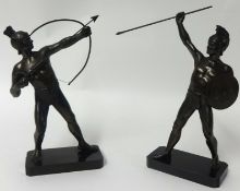 A pair of 20th century bronze figures of warriors with arrows and spears, 29cm tall