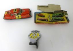 English tinplate miniature passenger train set, and a tinplate Fire Chief model car