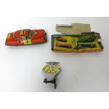 English tinplate miniature passenger train set, and a tinplate Fire Chief model car