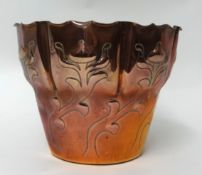 An Arts and Crafts copper planter, 18cm high, with impressed stamp to the base, S & D (?), 18cm high