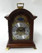 A Dutch reproduction bracket clock, the moon phase striking movement inscribed A. James with keys