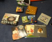 Various items including games, poker set, pool balls, vinyl albums, boxed chess set, roulette set