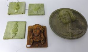 A terracotta wall plaque with portrait in relieve and eleven other composition and other plaques and
