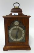 A small walnut cased reproduction bracket clock, the movement inscribed Rotherham's