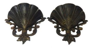 A pair of modern cast iron ornate wall planters (2)