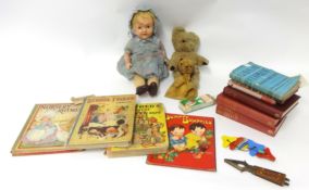 Various items including composition doll, old teddy bear, children's annuals, small Lesney diecast