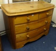 A Victorian bow fronted chest fitted with two short and two long drawers